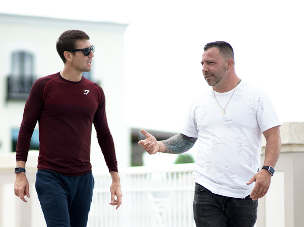 two sober men walking together