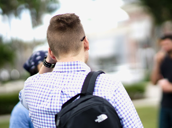 a group of sober men walking