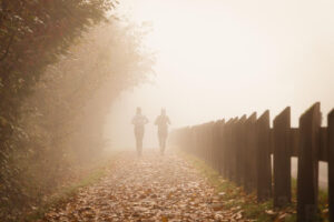 A woman jogging together with her sober buddy