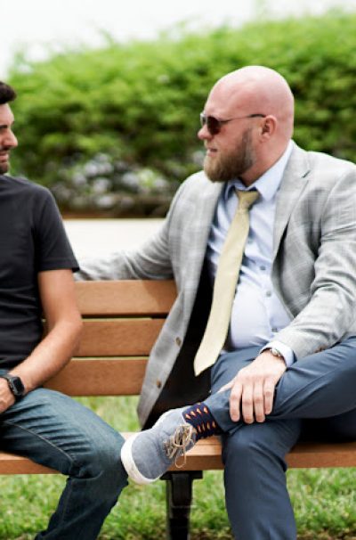 two sober men on a bench